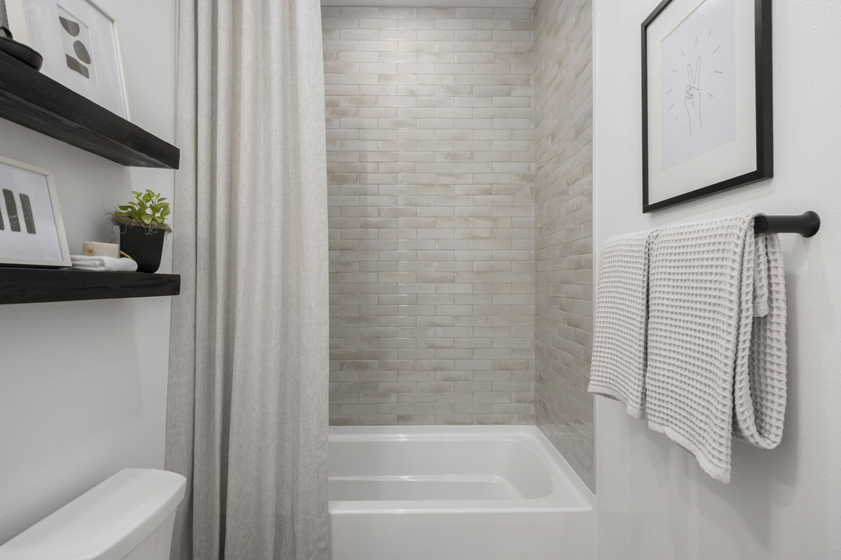 Tub/shower combination with tile surround at bath 2
