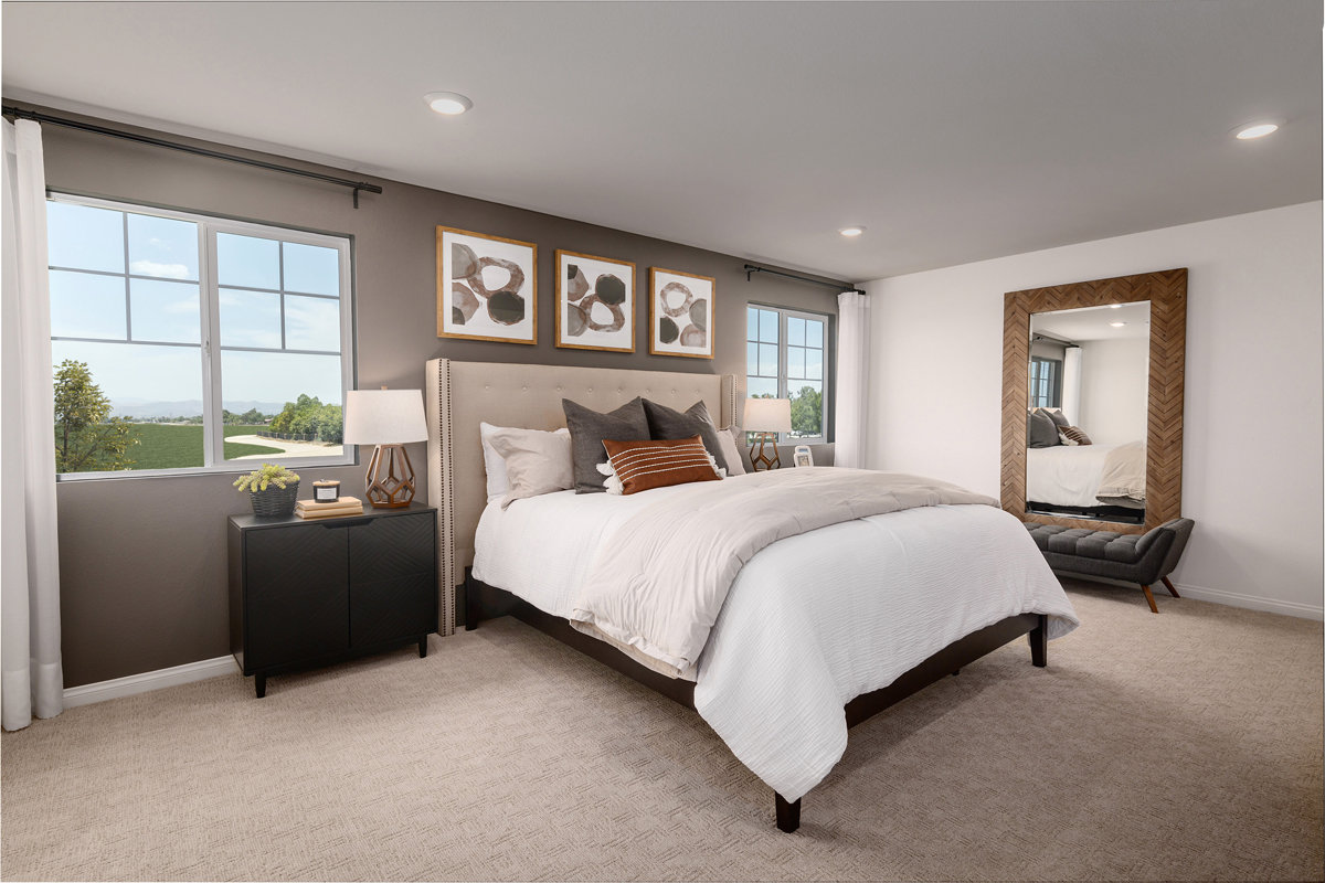 KB model home primary bedroom in Homeland, CA