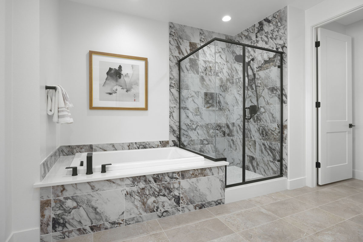 Optional tub and shower surround at primary bath