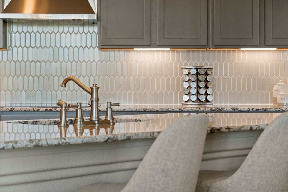 Tile backsplash at kitchen