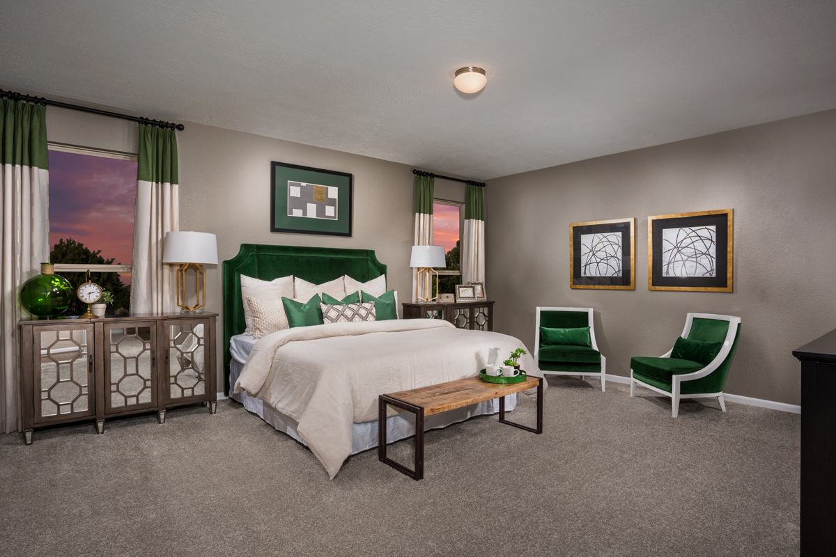 KB model home primary bedroom in Alvin, TX