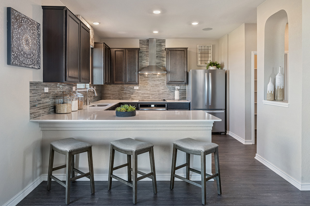 New Homes in San Antonio, TX - Hidden Canyons at TRP Plan 2100 Kitchen as modeled at Sky View