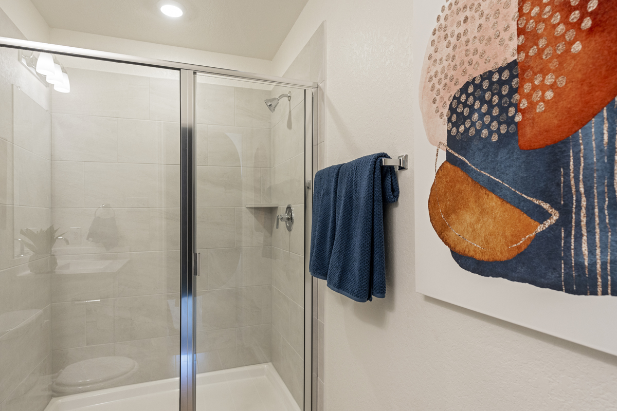 Shower with tile surround at bath 2