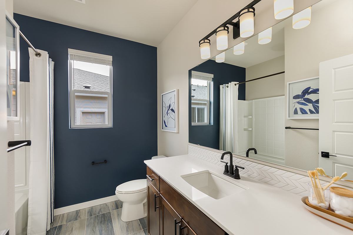 Quartz countertops at baths